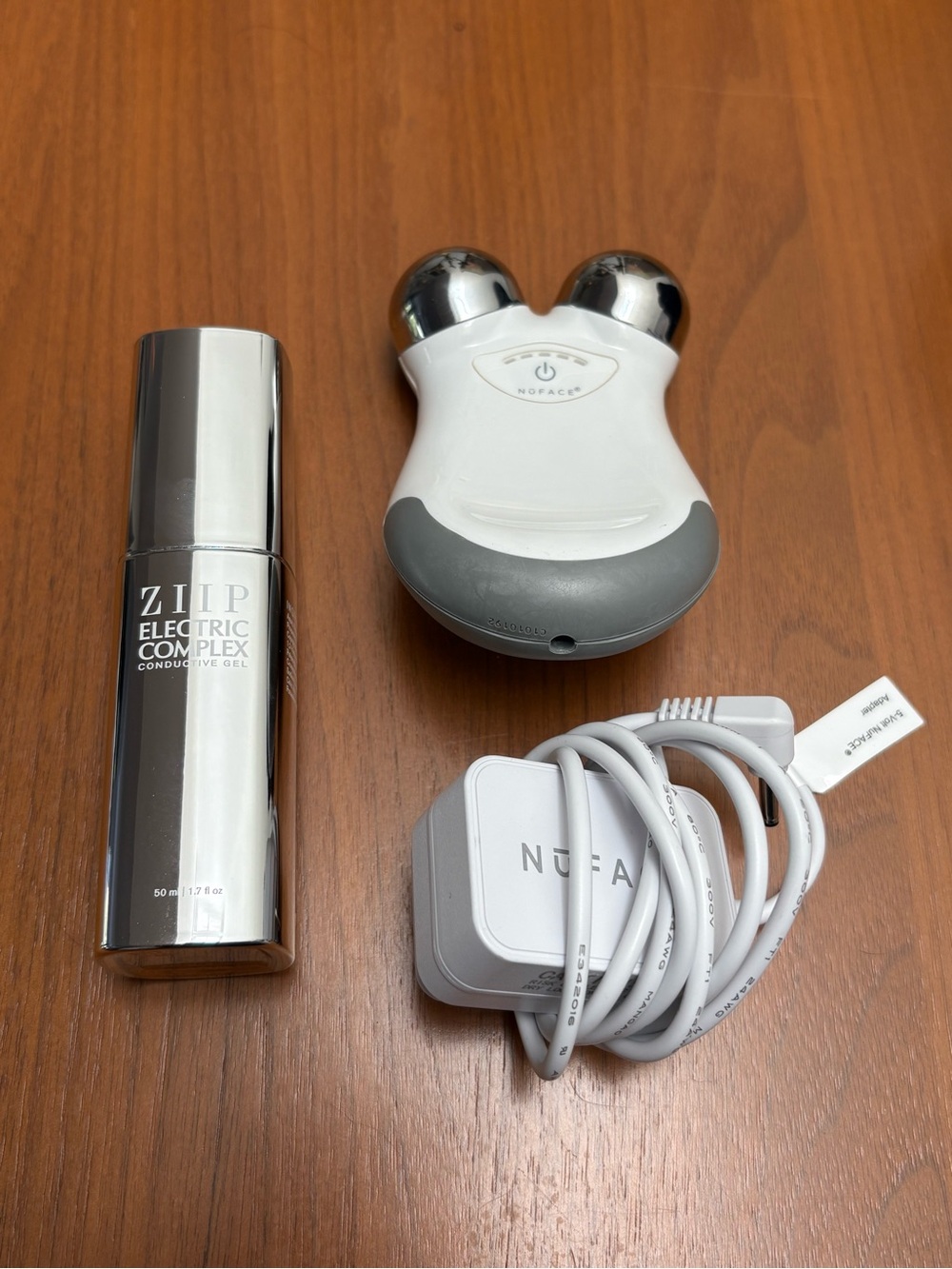 NWOT NuFace Mini microcurrent device w/ full-size electro gel